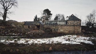View from SW of SW side of mill, showing water wheel