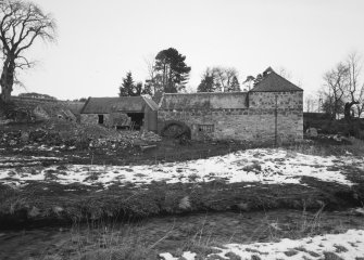 View from SW of SW side of mill, showing water wheel