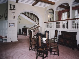 Interior.
View of main hall from E showing entrance gallery and principal staircase.