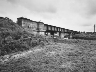 General view of railway bridge over River Don and Aberdeen - Inverurie Canal, from SE.