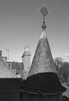 New house of Glack, detail of conical roof with cross shaped finial on top