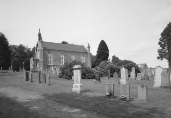 View from SE showing church and churchyard.