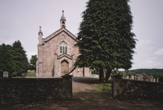 View from SW showing main entrance and gateway.