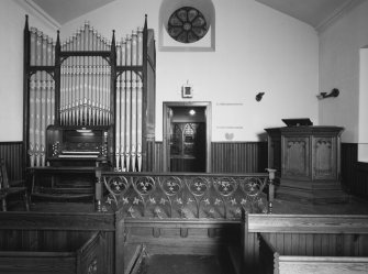 Interior.
View of raised dais, organ and pulpit.