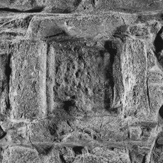 Panel in outer face of N wall

