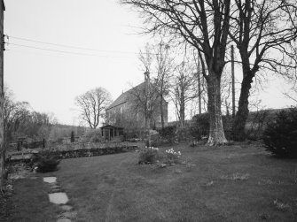 View of garden and church from SW.