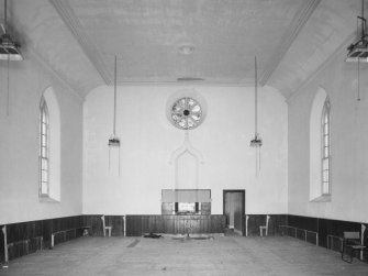 Interior.
View of rose window and original location of pulpit from N.