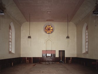 Church interior.
View of rose window and original location of pulpit from N.