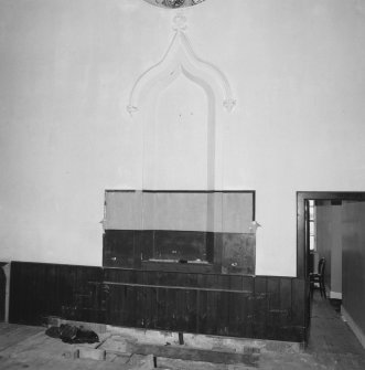 Church interior.
Detail of original location of pulpit with Gothic ogee headed recess, line of steps and stencil decoration.