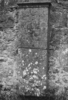 Detail of 18th-century grave-slab set against S wall of church