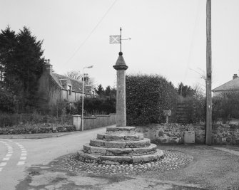 General view of market cross in Old Rayne. 
