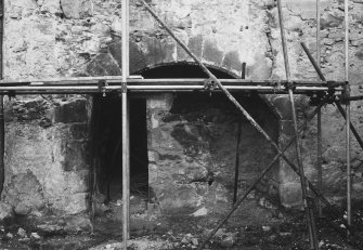 View of West wall showing kitchen fireplace on external wall.