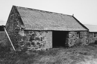 View of out-building from South-East.