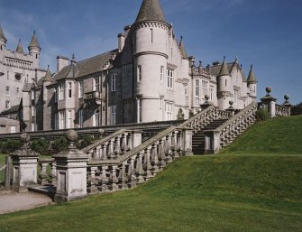 View of stone staircase and rear of castle from north west