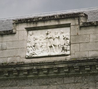 Detail of carved panel on west face of ballroom