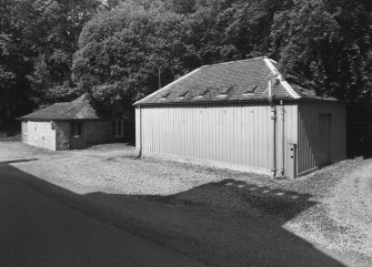 View of outbuilding and electricity substation from east