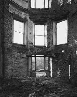 Interior, drawing room.
View showing surviving plasterwork in bay window, lower section of West wall.