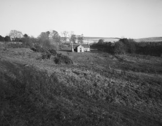 Cruciform Building (former cottage).
Distant view from South-West.