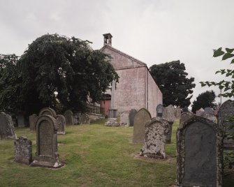 View from E showing setting in churchyard