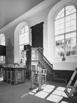 Interior.  Pulpit and flanking windows from NW