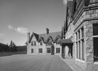 View of South West wing and main entrance porch from East