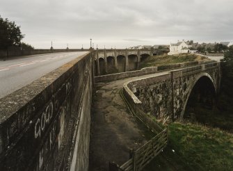 View from NNW showing the new bridge (left), with the old bridge (foreground right)