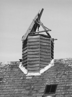 Detail of round wooden revolving ventilator on roof of kiln.