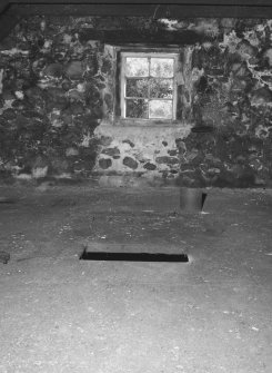 Interior.
View showing kiln floor, which is made up of perforated cast-iron tiles.