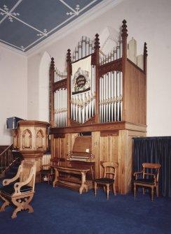 Interior. Organ and pulpit. View from SE