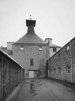 View from SW of NW maltings Kiln, with range of former maltings floors to right.