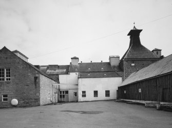 View from SW of Tun Room, Mash House and Malt Bins, former maltings Kiln, and Cask Store.