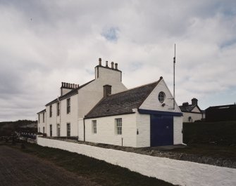 General view of coastguard station and houses from SE