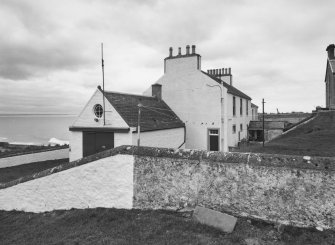 View from E of coastguard station, with houses behind