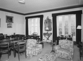 Interior. First floor. Drawing room showing the windows (dining table and chairs not originally in the room)