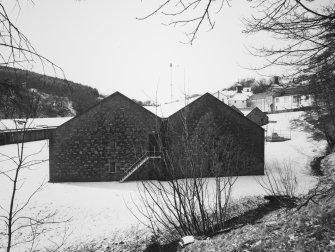 General view from NE of duty free warehouse No 1, with remainder distillery in background.