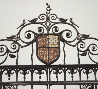 Detail of coat of arms inset into gates.
