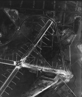 RAF WWII vertical aerial photograph showing the runways during the construction phase.Also visible are areas of anti-landing ditches on the limits of Spey Bay.