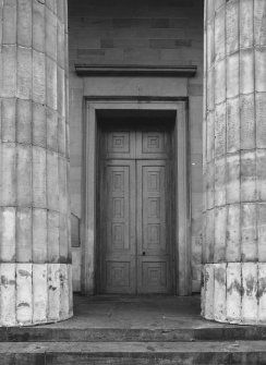 Detail of W doorway and Doric columns