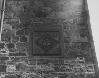 Detail of inset stone in tower.