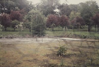 View of tennis courts in grounds.