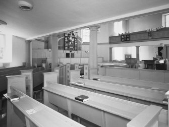 Interior. Ground floor showing organ, pews and gallery