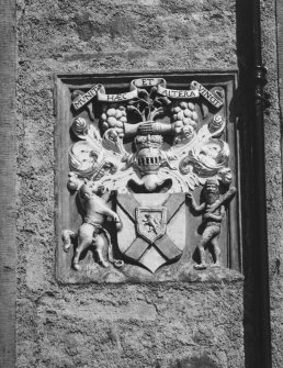 Detail of heraldic panel on W front.