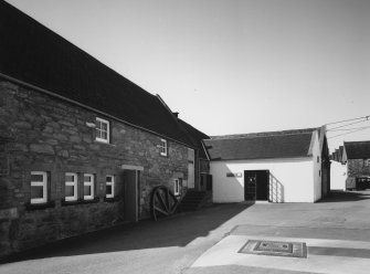 View from S of Visitor Reception Area and Filling Store (now disused - filling for Chivas distilleries occuring centrally elsewhere in Keith).
