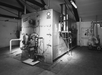 Detail of Cochran (of Annan) Chieftan boiler, now disused, formerly burning oil, 155 psi, Hamworthy burner, installed in 1966. Steam now provided from neighbouring Glen Keith Distillery
29-4-1993