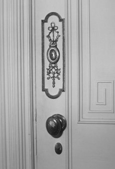 First floor, central room (South), door furniture and Greek key panelling, detail