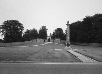 Monument and gate lodges, distant view from South South West