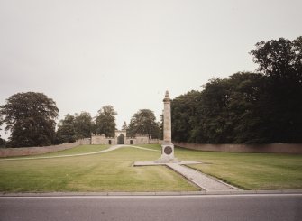 Monument and gate lodges, distant view from South South West