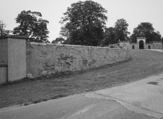 Wall (leading up to gateway), view from South West