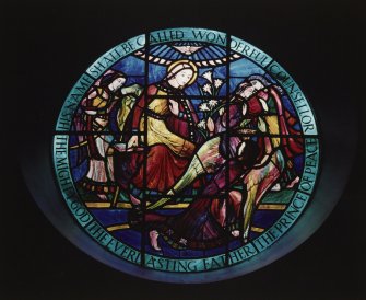 Interior. S stained glass rosewidow " HIS NAME SHALL BE CALLED...." by Charles Florence ud.