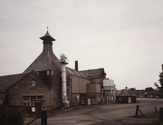 General view of range containing former Kiln, Mash House and Still House from NE.